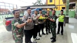 HUT TNI Ke-78, Koramil Omben Diberi Kejutan Tumpeng
